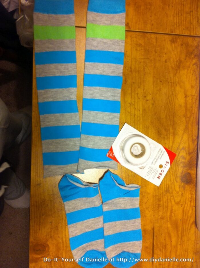 Blue, green, gray baby leg warmers using upcycled long socks and hem tape. These are easy and no sew.