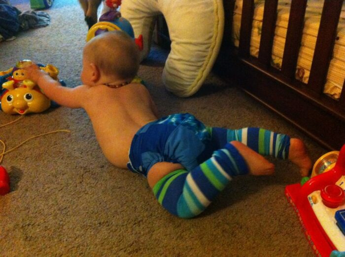 Fold over elastic used on the bottom of these baby leg warmers to cover the raw edge. These were upcycled long socks. 