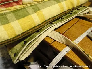 Adding snaps to picnic blanket so it can be carried closed.
