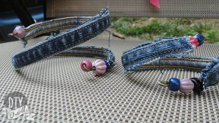 Two denim bracelets made with upcycled jeans and beads.