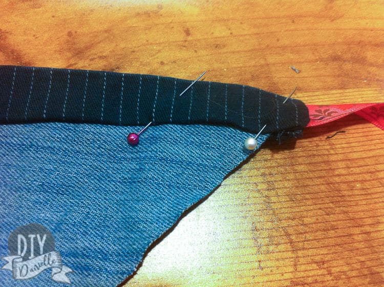 Edge of kerchief pinned in place.