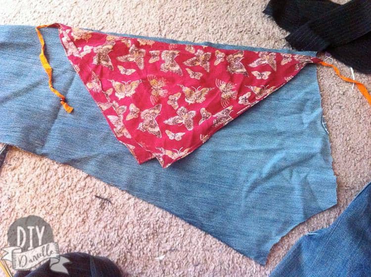 Using an old bandanna as a template for the denim kerchief.