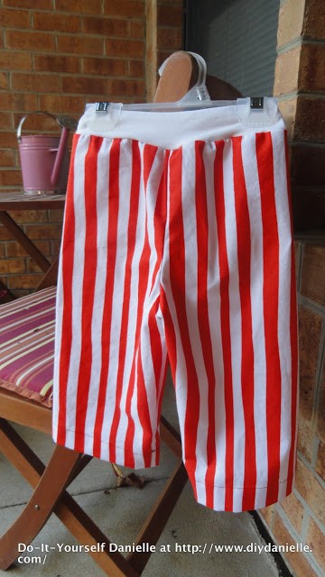 Dr. Seuss themed pant: red and white stripes, white waist band. 