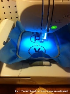 Embroidering letters for "Happy Birthday"