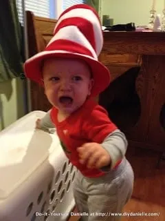 Angry baby wearing the Cat in the Hat Hat