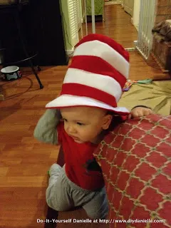 1 year old modeling the Dr. Seuss themed hat