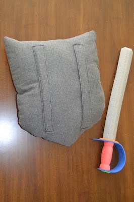 Back of the fabric shield, paired with a foam sword.