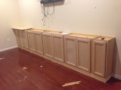 Cabinets used as a base for the entertainment center.