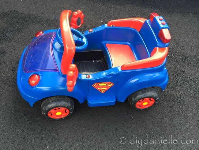 Superhero Car DIY: Superman ride on car with red and blue spray paint.