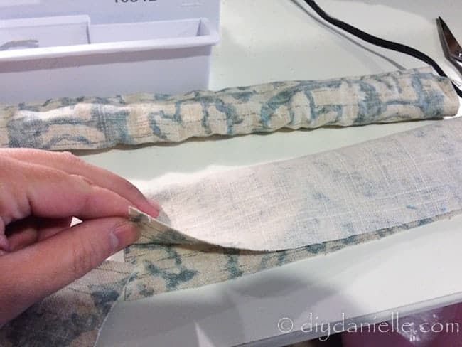 How to make a strap for a yoga bolster pillow.
