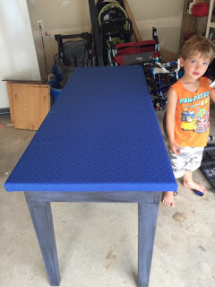 Installed gaming felt on the upcycled gaming table.