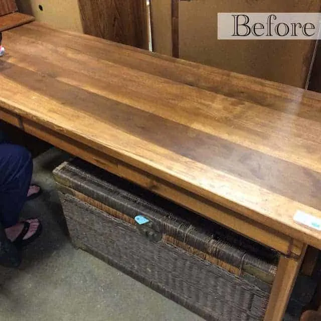 Before Picture: How to repurpose a table into a gaming table and desk. This upcycle involves distressing the furniture piece, installing gaming felt (poker table cloth), adding a wood edge around the table, adding a top for the table, and using mod podge 