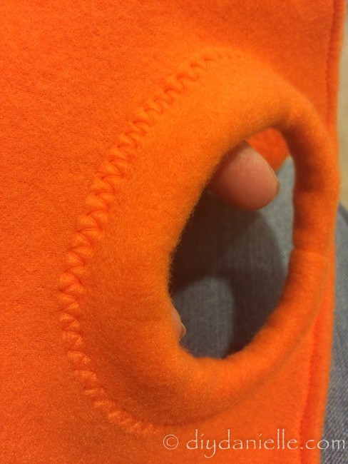 Orange bands added to the orange fleece coat.