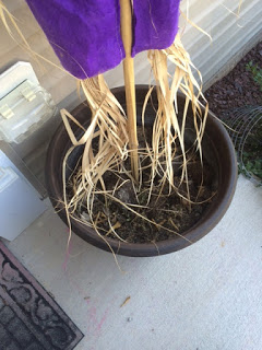 Using an empty planter to make porch decor.