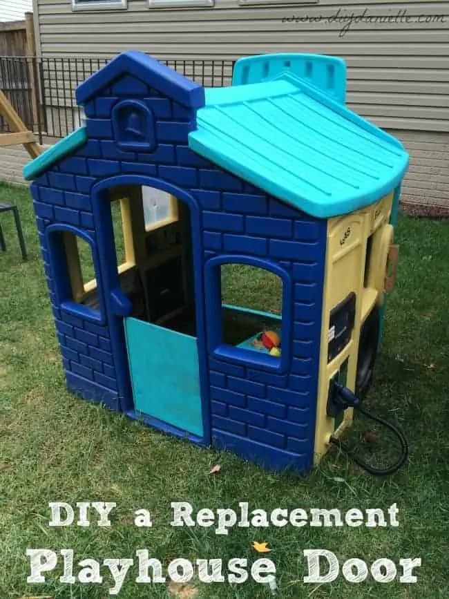 This is our completed playhouse, painted and with the replacement door installed!