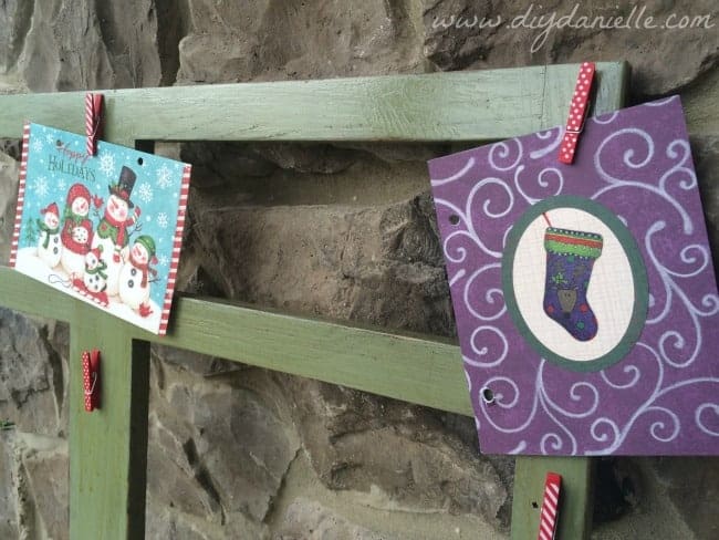 Holiday card display DIY using clothespins.