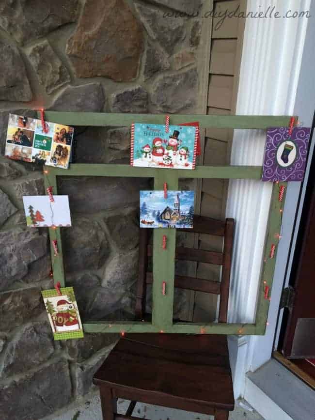 Christmas card display lit up with LED lights.