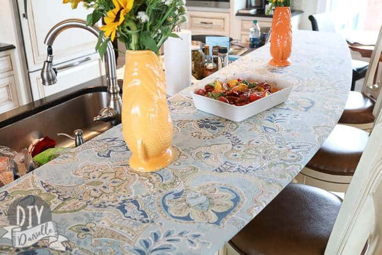 Handmade fitted tablecloth that was made to prevent lots of cleaning on the glass bar. 