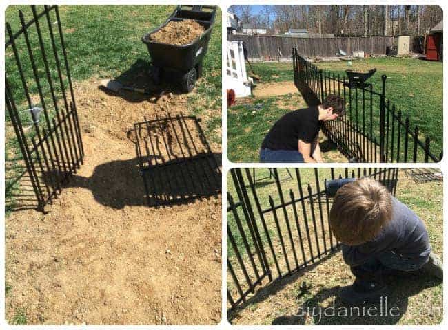 Installing the dog fence and gate for the DIY dog run.