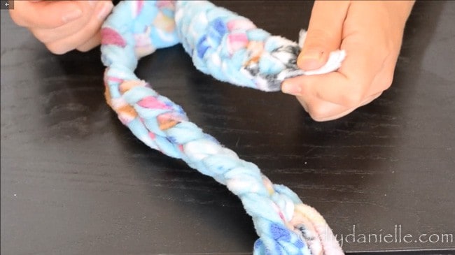 Braided fleece fabric for a dog tug toy.