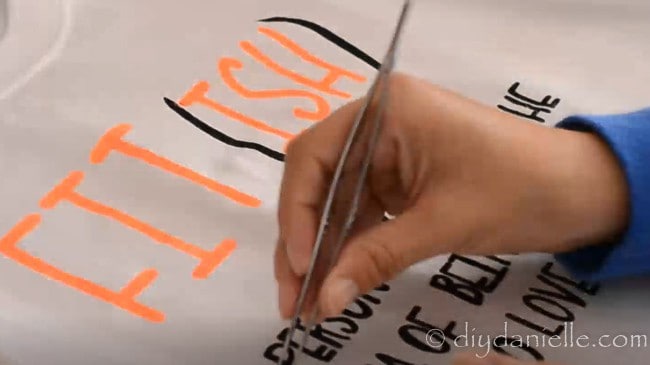 Tweezers to remove small pieces of the freezer paper stencil from the tshirt.