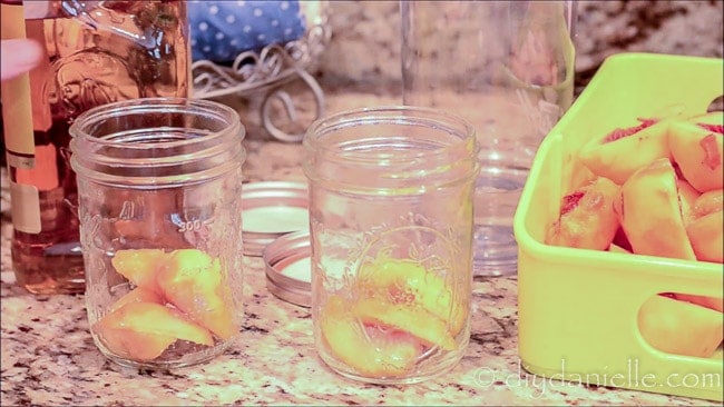 Add fruit to your mason jar.