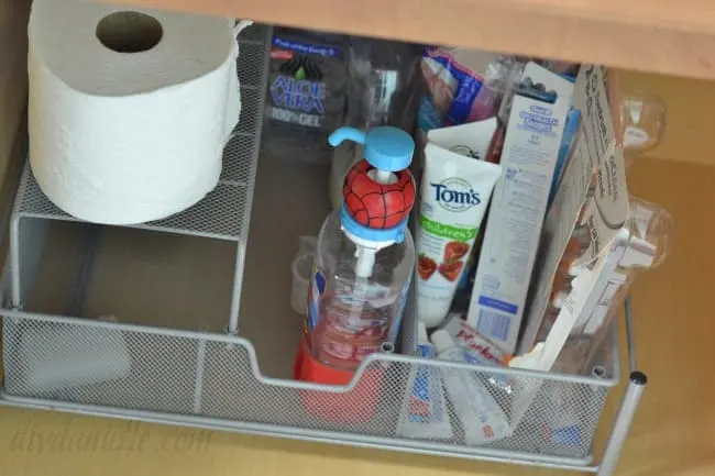 A safe, organized cabinet for a child's bathroom: No medicine, no chemicals, and nothing sharp.