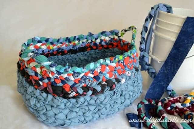 Braided fabric basket, made from upcycled clothing.