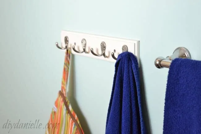 Coat hangers are good for hanging towels and wet bags.