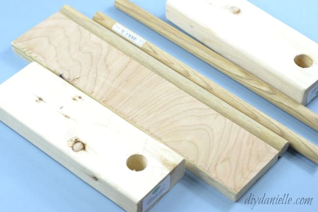 Supplies for DIY Drawer Organizer: Dowels, 2x4s, and a Scrap of 3/4" plywood