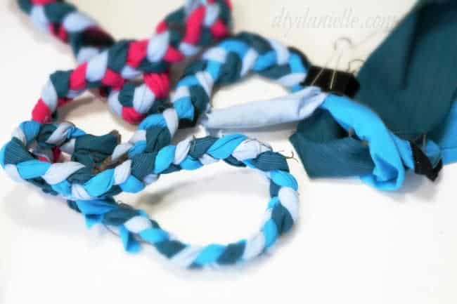 Braid your fabric together into long strips.