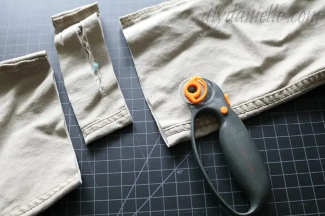 Remove fabric that is ripped or worn from the pants.