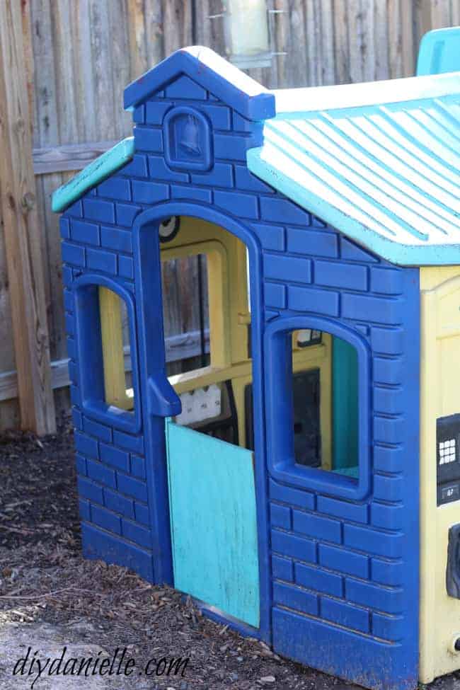 Blue paint lasted longer than the other colors on this painted plastic playhouse.