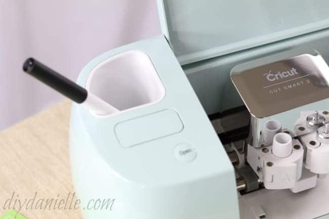 Storage compartments built into the Cricut Air 2