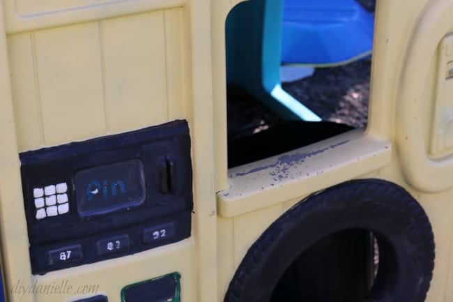 Faded paint along seam lines of a painted plastic playhouse.