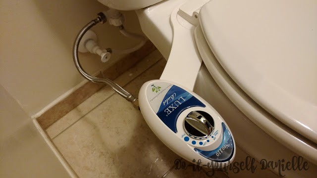 Attach your T connector and tubes for the bidet sprayer.