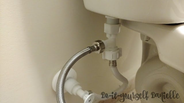 T connector for the bidet sprayer attachment.