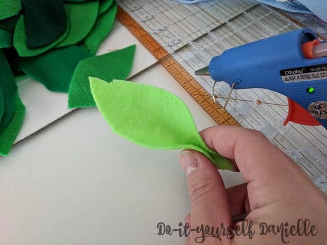 3D leaf effect made by using hot glue and pinching the bottom of the leaf.