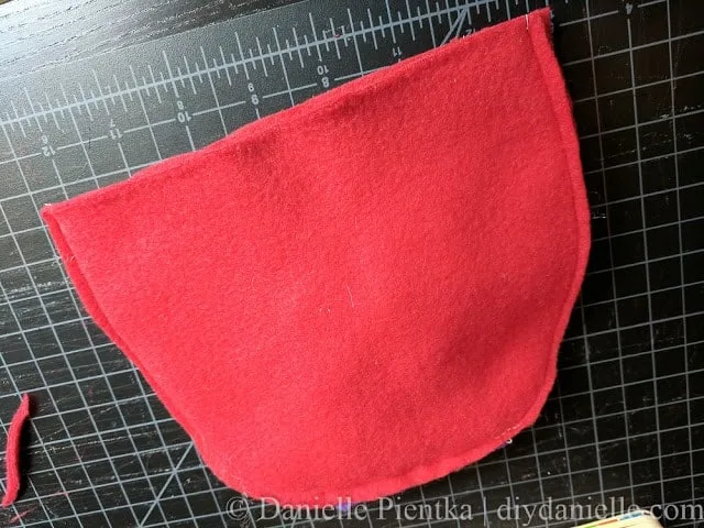 Sew baby hat closed, right sides together, then trim excess fabric. Turn right sides out.