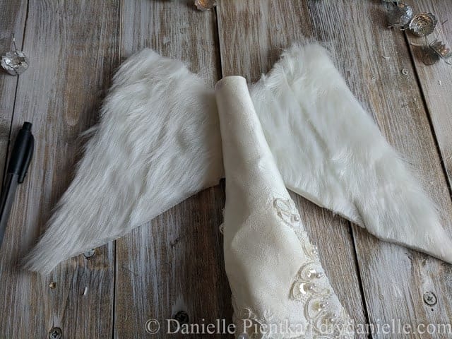 Gluing on the wings for the angel.