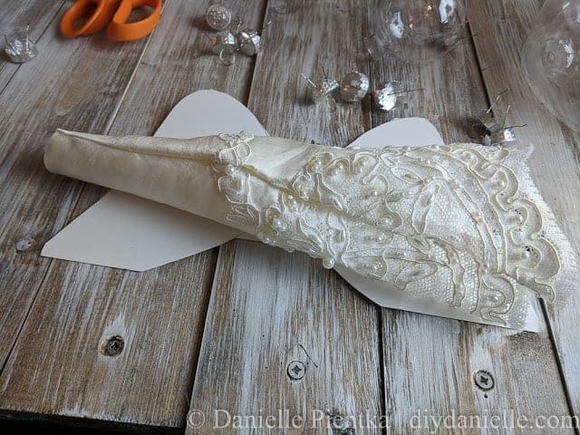 Creating a dress for the angel using an upcycled wedding dress.