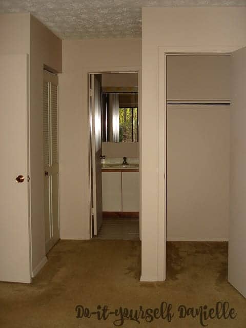 Photo looking into the master bathroom from the master bedroom. 1980's style condo.