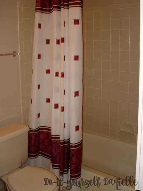 1980's style master bathroom in a condominium- bathtub and toilet.