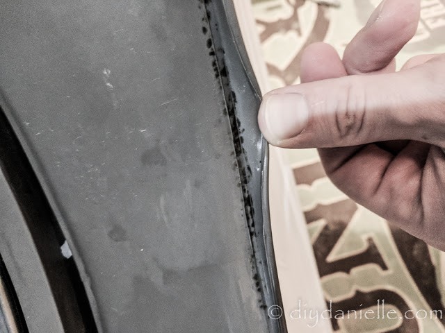 Mold from water build up near the door of a front loader washer.