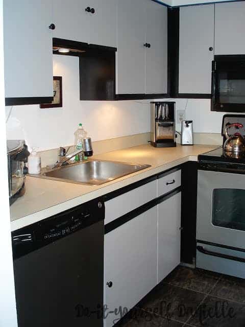 Updating a 1980's kitchen with laminate cabinets using paint.