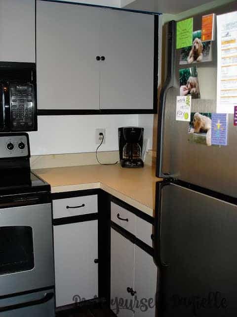 Painted laminate cabinets in gray and black.