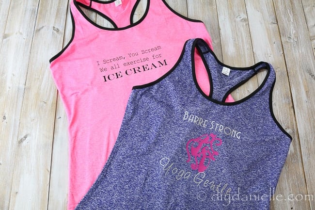 Two gym shirts with Cricut Sportflex Vinyl. Pink shirt says, "I scream, you scream, we all exercise for ice cream." and the purple shirt says, "Barre strong, yoga gentle" with ballet shoes.