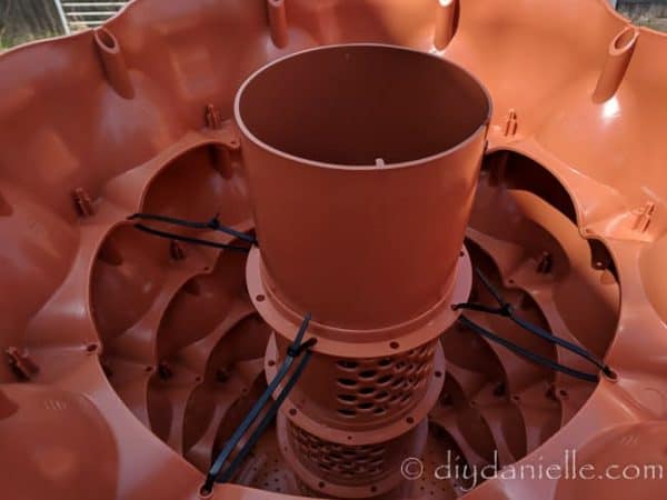 The Garden Tower 2 uses 6 cu ft of potting soil.