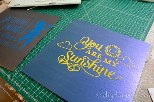 "You are my sunshine" nursery sign with metallic blue flash paint and yellow outdoor vinyl.