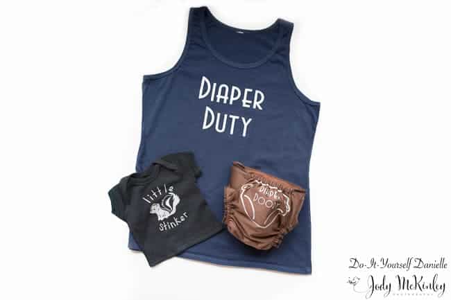 How to create this diaper duty shirt set with your Cricut machine and iron on vinyl.